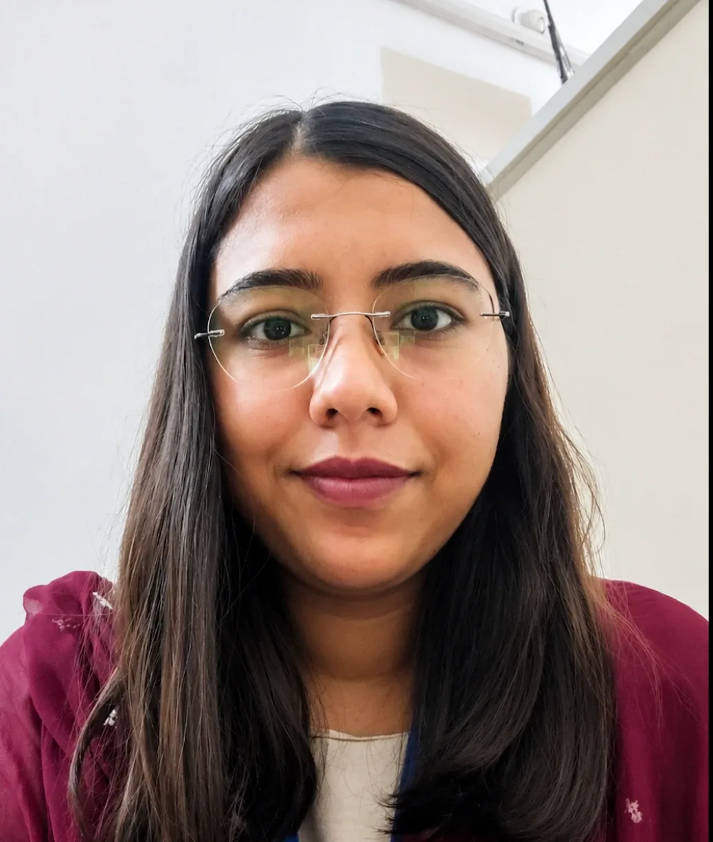 Shivani Kirar clinical psychologist professional headshot, warm approachable expression, soft natural light, authentic