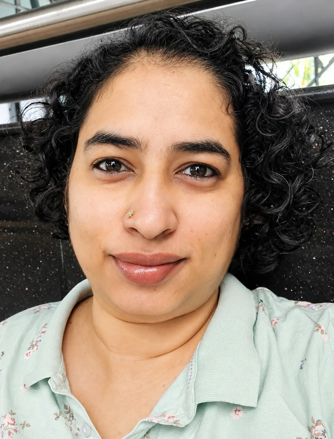 woman lactation consultant supporting a mother with breastfeeding her newborn, empathetic and patient